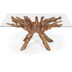 a glass table with wooden branches on the top and bottom, in front of a white background