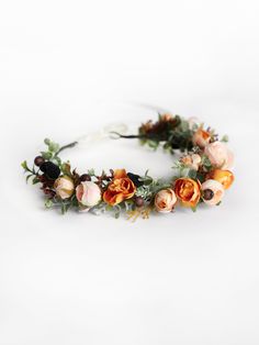 Elegant Coral flower crown is a hand-made item made in my studio. I was inspired by nature and natural color for this crown. Also, you are welcome to order custom composition, because I know how it is important to have everything perfect for your important event.  During making this fall flower headband, I use only high-quality flowers and handwork to create a masterpiece that will emphasize your beauty and uniqueness in your special day.   Size: Adjustable to fit both kids and adults Materials: faux flowers + Beautiful high-quality materials + 100% handmade + All items will be made to order special FOR YOU ---> All of them are unique + Your item will be gift packed for free + The colors of main flowers can vary, just write us + Feel free to ask about the custom order  WE DO ALL FOR YOU TO Orange Flower Crown, Fall Flower Girl, Flower Crown Flower Girl, Fall Flower Crown, Woodland Crown, Boho Crown, Floral Crown Wedding, Music Flower, Fleur Orange