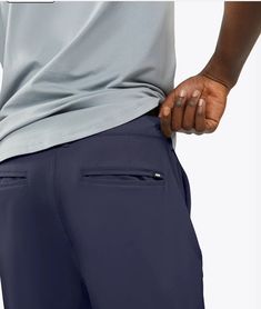 The ultimate shorts for the course, office, and everything in between. Available in 7" inseams, these shorts are crafted from high-quality materials for optimal durability and comfort. With their stylish design and practicality, these are a must-have for modern men who demand the best. MB10393N Athleisure Golf Shorts, Golf Bottoms With Built-in Shorts And 4-way Stretch, Navy Functional Shorts, Navy Go-dry Short Length Bottoms, Functional Golf Bottoms With Built-in Shorts, Functional Navy Bottoms With 4-way Stretch, Stretch Golf Shorts, 4-way Stretch Shorts With Pockets, 5-inch Inseam, Casual Blue Golf Bottoms