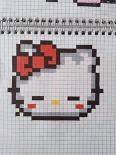 an open notebook with a hello kitty design on it