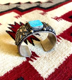 This is an original Darryl Becenti sterling silver cuff bracelet, adorned with a beautiful turquoise square. Like all of Darryl's pieces, the high amount of pure silver gives it a substantial and rich feel. Western Ideas, Navajo Art, Native American Paintings, Signature Stamp, Sterling Silver Cuff Bracelet, Man Style, Petrified Wood, Sterling Silver Cuff, Silver Cuff Bracelet