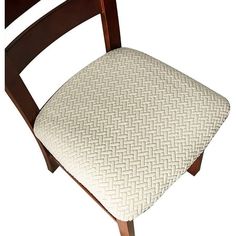 a close up of a wooden chair with a cushion on top of it's back