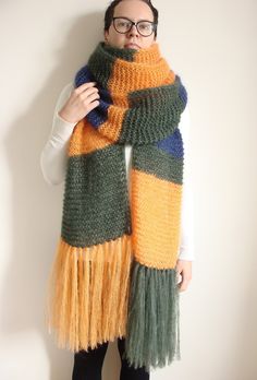 ">> Match the hat to this scarf: https://www.etsy.com/shop/WoolFans?ref=seller-platform-mcnav&section_id=14152943 >> Extremely soft and delicate knit mohair scarf with long, lush tassels and irregular stripes provides warmth and color during winter time. The shawl is wide and long and can be wrapped three times around your neck. It is hand-knitted with mohair and silk blend yarn for the most luxurious experience.  Perfect as a gift! >> Measurements:     length: 350 cm/138\",     width: 30 cm/12\ Cozy Winter Scarves With Fringe, Winter Mohair Shawl One Size, Hand Knitted Mohair Scarf For Winter, Winter Mohair Shawl Scarf, Hand-knitted Mohair Scarf For Winter, Mohair Shawl Scarf For Winter, Hand Knitted Alpaca Scarves, Bohemian Hand Knitted Alpaca Scarves, Woolen Scarf