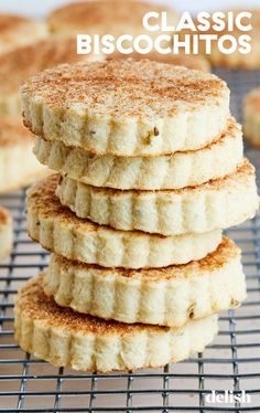 a stack of biscuits sitting on top of a cooling rack with the words classic biscuits