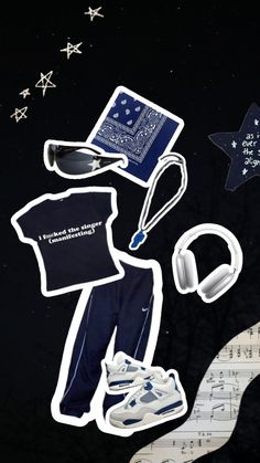 various items are arranged in the shape of a star and music notes on a black background