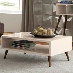 a coffee table with some books on it