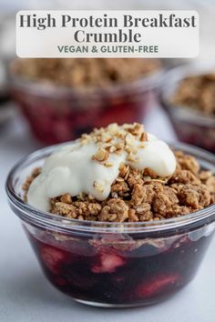 a close up of a bowl of food with yogurt and granola on top