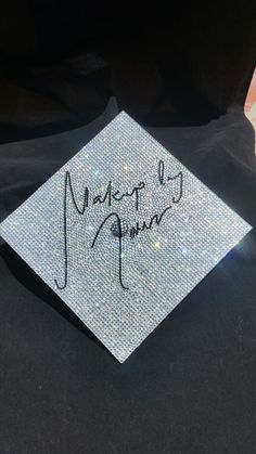 a white graduation cap with the words happy new year written in cursive writing on it