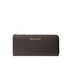 This sleek wallet is crafted from MK's iconic Signature-print canvas with contrasting trim for added flair, its slim silhouette partially unzips to reveal multiple card slots and a center compartment perfect for just the essentials.  DETAILS • Wallet • Logo-print coated canvas • 89.4% coated canvas/9.6% polyester/1% polyurethane • Gold-tone hardware • 7.75"W X 3.75"H X 1"D • Interior details: 2 slip pockets, zip pocket, 8 card slots • Lining: 100% polyester • Zip fastening • Imported Michael Kors Bifold Wallet With Card Slots, Michael Kors Luxury Travel Wallets, Michael Kors Travel Wallet Rectangular, Michael Kors Brown Wallet With Zipper Closure, Michael Kors Travel Wallets With Gold-tone Hardware, Contrasting Trim, Print Coat, Zip Wallet, Signature Print