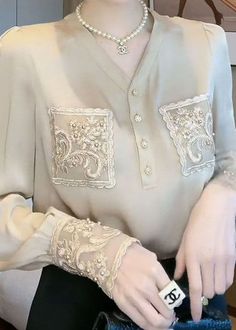 Elegant White Patchwork Blouse, Elegant Fitted Blouse With Patchwork, Elegant Fitted Tops With Patchwork, Elegant Fitted Patchwork Tops, Elegant White Blouse With Patchwork, Elegant V-neck Blouse With Patchwork, Elegant V-neck Patchwork Blouse, Elegant V-neck Blouse With Lace Patchwork, Elegant Patchwork Tops For Workwear