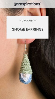 a woman wearing earrings with the words crochet gnome earring on it's side