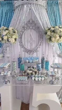 a table with blue and white decorations on it