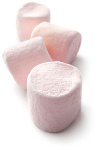 three marshmallows on a white background, one pink and the other light pink