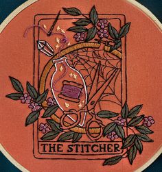 the stitcher has been embroidered onto an orange background with pink flowers and green leaves