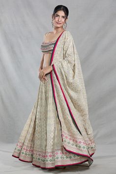 Multi color and cream banarasi silk gathered flare lehenga with all over bandhani bloom crest woven detail and aari-sequin-thread hand embroidered highlights. Paired with a blouse with fleur embroidery using sequin-thread-aari highlights and a banarasi silk dupatta. - Aza Fashions Wedding Cotton Silk Pre-draped Saree With Motifs, Off White Designer Wear Sets For Transitional Season, Off White Designer Sets For Transitional Season, Off White Sets With Zari Work For Transitional Season, Beige Pre-draped Saree For Festive Occasion, Festive Beige Sets With Traditional Drape, Anarkali Style Pre-draped Saree In Cream With Dupatta, Anarkali Style Pre-draped Cream Saree, Anarkali Style Cream Pre-draped Saree