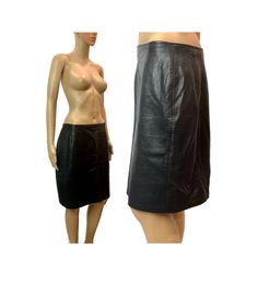 Vintage 80s era soft luxurious lightweight leather skirt. Shorter, above knee length. Straight, pencil cut with zipper at center back. Lined. LABEL : Grownbeans, New York, Karen Groner, made USA CONDITION : Excellent vintage condition with no flaws SIZE : unmarked - Please compare measurements to a similar garment you own allowing a little room for differences in measuring tools and techniques Mannequin in photos is 24" waist, 34" hip - skirt is very loose on form MEASURED : waist, flat : 15.5" hip, flat : 21" hem, flat : 20" length, side seam : 20.5" length, front : 20" zipper : 7.5" vent : 4.25" (InS) 80s Era, Black Leather Skirt, Hip Skirt, Measuring Tools, Black Leather Skirts, Above Knee, Leather Skirt, Favorite Outfit, Knee Length