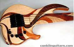 a wooden guitar with an intricate design on it