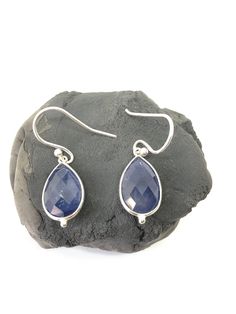 Material:- 925 Sterling Silver Purity of Silver: 92.5% Pure Gemstone :- Blue Sapphire Gemstone Shape: Pear / Teardrops Gemstone Size:  12x9 mm (approx.) Earring Length : 1.25 Inch (approx.) Gross Earring Weight :- 3.81 Grams (approx.) Stone Weight :- 2.40 Gram (approx.) Silver Weight:- 1.41 Gram (approx.) Code: 50 For More Earring Design :- https://www.etsy.com/in-en/shop/TheGemStoneCenter?ref=seller-platform-mcnav&section_id=40513744 Teardrop Sapphire Earrings For Gift, Hypoallergenic Sapphire Jewelry As Gift, Hypoallergenic Sapphire Jewelry For Gifts, Blue Sapphire Earrings For Gift, Sapphire Blue Earrings For Gift, Sapphire Hypoallergenic Drop Earrings, Hypoallergenic Sapphire Drop Earrings, Blue Sterling Silver Teardrop Earrings, Sapphire Sterling Silver Drop Earrings