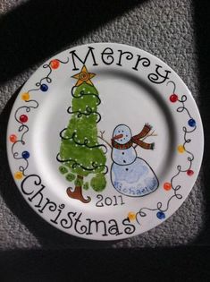 a white plate with a christmas tree on it