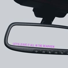 a rear view mirror with the words let's leave it all in the review