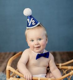 "Even cuter in person...if that's possible! A MINI party hat made non-flaky glitter blue material, decorated with a white 1/2, trimmed with baby blue mini pom poms on bottom and a baby blue/white speckled yarn pom pom on the top. Attached to a 1/8\" elastic- to be worn comfortably like a headband. Diameter of hat is 2.85\", and height 4\". BOW TIE: $8.50 A blue felt bow tie attached to a 5/8\" white elastic strap. Bow measures 3.25\"long x 1.75\" wide. Neck strap is about 12\" long with Velcro c Felt Bow Tie, Half Birthday, Felt Bows, Yarn Pom Pom, Blue Party, Birthday Hat, Hat Making, Birthday Photos, Party Hats