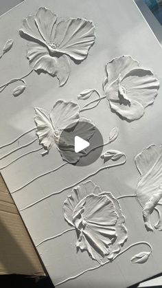 the paper is being made to look like flowers