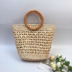 Bali Handmade Woven Rattan Bag Round Straw Shoulder Bag Women Summer New Hollow Out Retro Crossbody Bag Boho Beach Circle Bag Handmade handwoven ratta bean bags.This handcrafted bag is made with hand-harvested material and features a handle for carrying all your essentials. It's soft, lightweight, warm and has a detachable shoulder strap to keep it all together in one place! This bag also comes fully lined so you can carry all the necessities as you go about your shopping or travel. The bag carr Natural Color Handheld Hobo Bag For Vacation, Beige Handheld Beach Bag With Bamboo Handle, Handheld Beige Beach Bag With Bamboo Handle, Eco-friendly Handheld Bags With Braided Handles, Eco-friendly Handheld Bag With Braided Handles, Eco-friendly Bucket Bags With Bamboo Handle, Eco-friendly Natural Satchel Bag, Natural Handheld Bag For Beach Season, Eco-friendly Bucket Shoulder Bag With Bamboo Handle