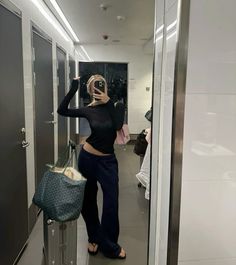 Airport outfit: skims long sleeve top, brandy melville sweatpants, goyard bag, rimowa suitcase, chanel classic flap Airport Mirror Pic, Travel Fits Airport, Black Airport Outfit, Airport Purse, Cute Airport Fits, Airport Outfits Winter, Outfit Inspo Lazy