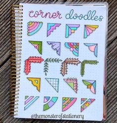 an open notebook with doodles on it and the words corner doodles written in different colors