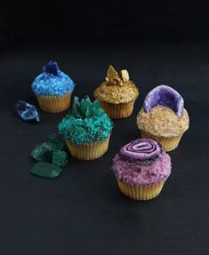 some cupcakes with different colored frosting on them and the words, diy gemstone cupcakes