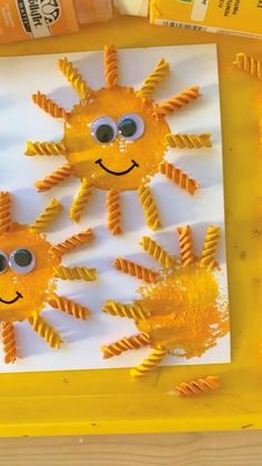 an art project made out of pasta and googly eyes for kids to make sunflowers