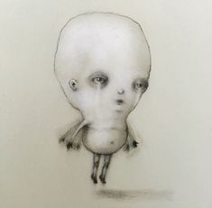 a drawing of an alien head with one eye open