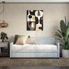 a living room scene with focus on the daybed and potted plant in the foreground