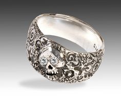 Totally custom made by me in my SoCal studio. Very unique women's Sterling Silver skull ring with 2mm genuine diamonds (or your choice of stones) inset eyes. Individually hand carved in wax to size then cast in solid sterling silver using the ancient art of lost wax casting... Custom made to order. Diamonds may be substituted with stones of your choice. Feel free to contact me with any questions or custom requests. Please contact me for international shipping rates. Motorcycle Jewelry, Skull Wedding Ring, Sterling Silver Skull Rings, Skull Engagement Ring, Diamond Skull, Silver Skull Ring, Black Engagement Ring, Handmade Gold Jewellery, Best Friend Jewelry