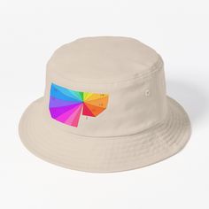 a white bucket hat with a rainbow umbrella on it's brimmed visor