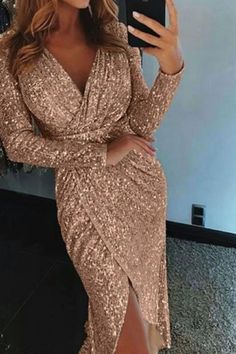 Step into the spotlight with our Women's Sequined Long Sleeve V-Neck Plus Size Party Dress. The alluring combination of sequins, a flattering V-neck, and long sleeves creates a glamorous look for your special occasions. Designed with your curves in mind, this dress offers a stunning silhouette that exudes confidence and style. Make a statement and turn heads at any party or event with this elegant and fashionable ensemble tailored for the plus-size beauty. Gold V-neck Midi Dress For Party, Gold V-neck Midi Dress For Party Season, Elegant V-neck Dress With Surplice Neckline For Party, Glamorous Long Sleeve V-neck Party Dress, Fall Party V-neck Maxi Dress, Glamorous V-neck Evening Dress For Spring, Glamorous Spring V-neck Party Dress, Holiday V-neck Evening Dress For Night Out, Fitted Maxi Length V-neck Dress For Party