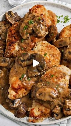 chicken with mushrooms and gravy in a white bowl