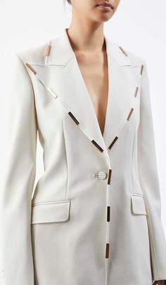 Say hello to our High-Rise Flared Jacket Suit in Ivory! This chic ensemble features a high-rise flared jacket that's as stylish as it is playful. Perfect for young trendsetters who love to mix modern flair with classic elegance, this suit is an ivory stunner that's all about making a grand entrance. It's not just a suit, it's your ticket to the fashion hall of fame! Gentle Dry Clean Only Colour may vary due to lighting on images. The product images (without model) are closest to the true colour Modern White Blazer With Hidden Button Closure, Trendy White Blazer With Lapel Collar, White Notch Lapel Outerwear For Party, Tailored White Outerwear For Party, White Single-breasted Outerwear For Parties, White Single Breasted Outerwear For Party, White Single Breasted Party Outerwear, Trendy White Office Blazer, Modern White Blazer