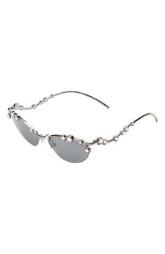 Gleaming crystals bring glamour to these sleek oval sunglasses with full sun protection. 56mm lens width; 19mm bridge width; 140mm temple length 100% UV protection Adjustable nonslip nose pads Metal/Swarovski crystal Imported Silver Rimless Evening Sunglasses, Luxury Oval Sunglasses With Mirrored Lenses, Elegant Rimless Shield Sunglasses With Anti-reflective Coating, Silver Rimless Anti-reflective Shield Sunglasses, Swarovski Sunglasses, Crystal Sunglasses, Makeup Bronzer, Perfume Gift Sets, Oval Sunglasses