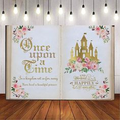 an open book with the words once upon a time and happily happily written on it