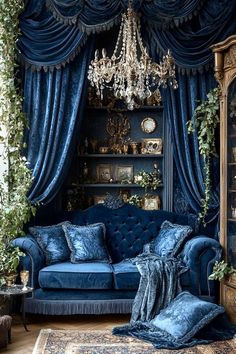 a living room with blue couches and curtains