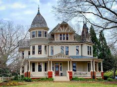 an old victorian style house with a turret