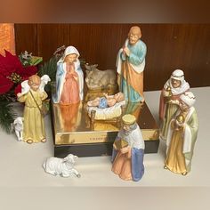 a nativity scene with figurines and decorations