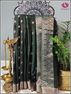 Softsilk green silver zari saree Silver Chanderi Traditional Wear With Zari Weaving, Silver Saree With Traditional Drape And Motifs, Silver Saree With Motifs For Diwali, Traditional Dark Green Wedding Saree, Silver Chanderi Handloom Traditional Wear, Silver Saree With Motifs In Traditional Drape, Festive Dark Green Traditional Wear With Pallu, Dark Green Traditional Wear With Cutdana For Festivals, Diwali Silver Saree With Motifs