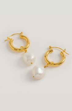 Add to your designer jewellery collection with these modern baroque pearl gold mini hoop earrings.  These classic hoop earrings are lightweight and the perfect staple earrings for every woman - perfect for gifts for her, these timeless earrings are a playfully customisable pair of gold hoop earrings that can be interchanged with any of our statement charms. More Details Handcrafted from luxurious 18ct Gold Plated Sterling Silver and unique baroque pearls.  Baroque freshwater pearls on a 18ct Gol Minimalist Gold Hoop Earrings With Baroque Pearl, White Baroque Pearl Single Hoop Earring, White Hoop Earrings With Baroque Pearl Charm, Single White Baroque Pearl Hoop Earring, Gold Baroque Pearl Hoop Earrings, Staple Earrings, Modern Baroque, Designers Jewelry Collection, Mini Hoop Earrings