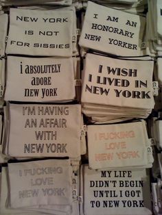 i am not new york t - shirts are stacked on top of each other in rows