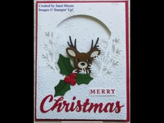 a christmas card with a deer and holly