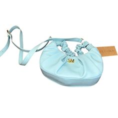 Brand New And Never Used Steve Madden Aqua Blue And Gold Handbag. Small Purse! See Photos For Estimated Lengths. Adjustable Strap For The Perfect Fit. Suede Inside. Adorable Designer Piece. Cute Ruffle Handle. Great For Any Day! Trendy Blue Hobo Bag With Top Handle, Blue Shoulder Bag With Detachable Handle For Spring, Trendy Blue Top Handle Hobo Bag, Trendy Light Blue Evening Bag, Light Blue Crossbody Shoulder Bag, Light Blue Evening Bag With Adjustable Strap, Chic Blue Mobile Phone Bag, Trendy Blue Hobo Bag With Detachable Handle, Light Blue Shoulder Bag With Detachable Handle