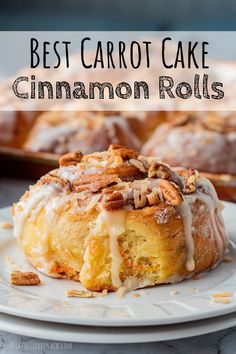 the best carrot cake cinnamon rolls on a plate