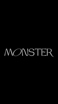 a black background with the word monster in white letters on it's left side